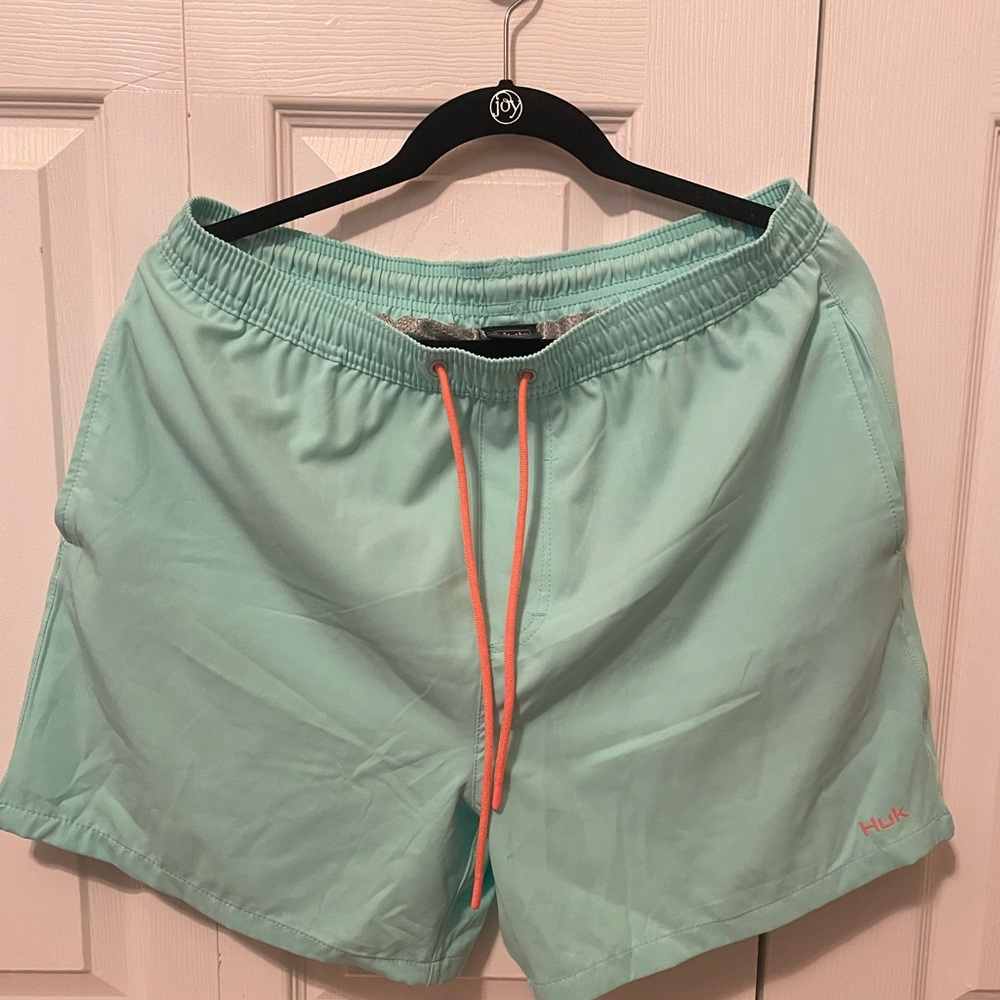 HUK swim shorts. Has 4 pockets. BNWT.